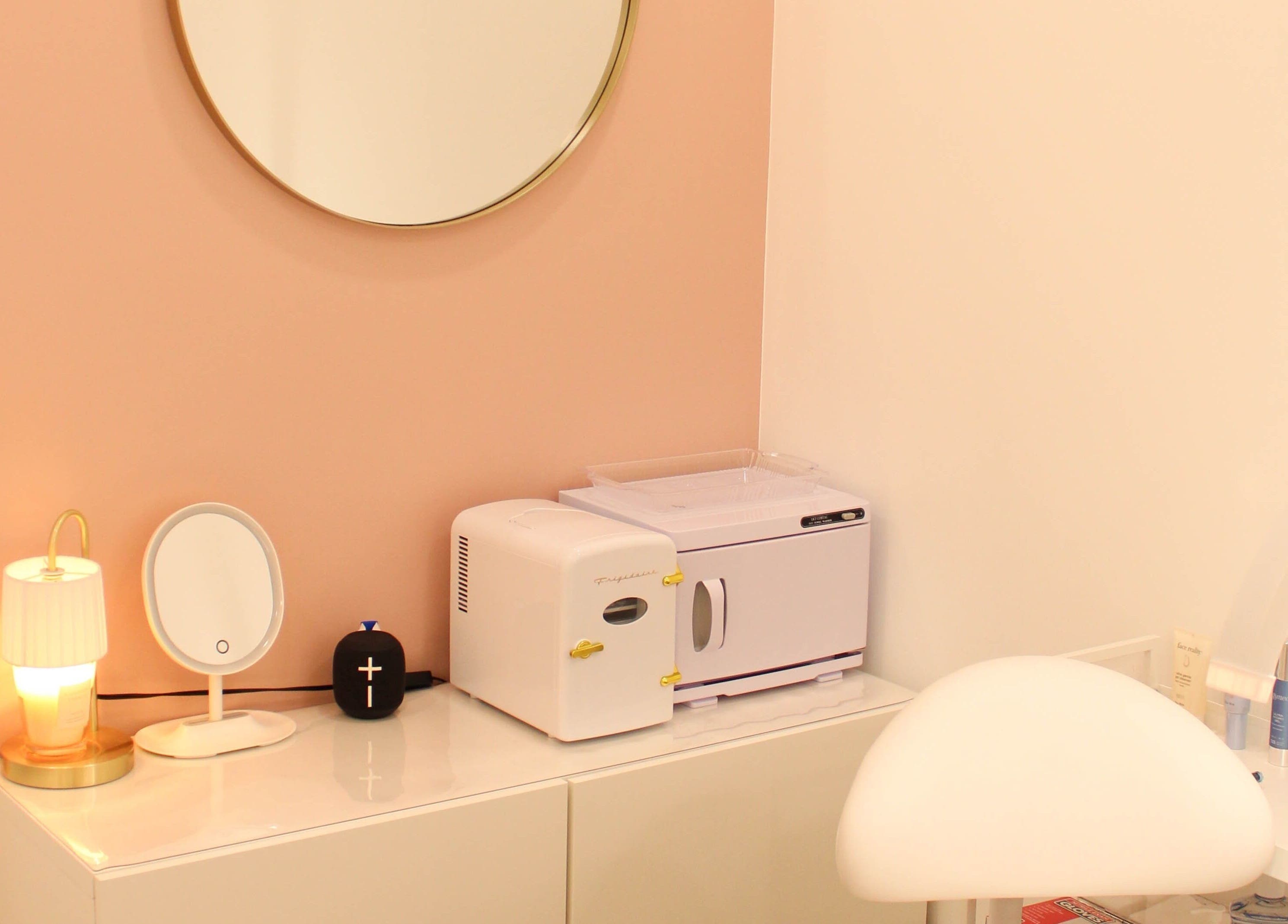 Modern beauty corner at Get Up and Glow Beauty Studio, Chehalis, Washington, US featuring skincare products.