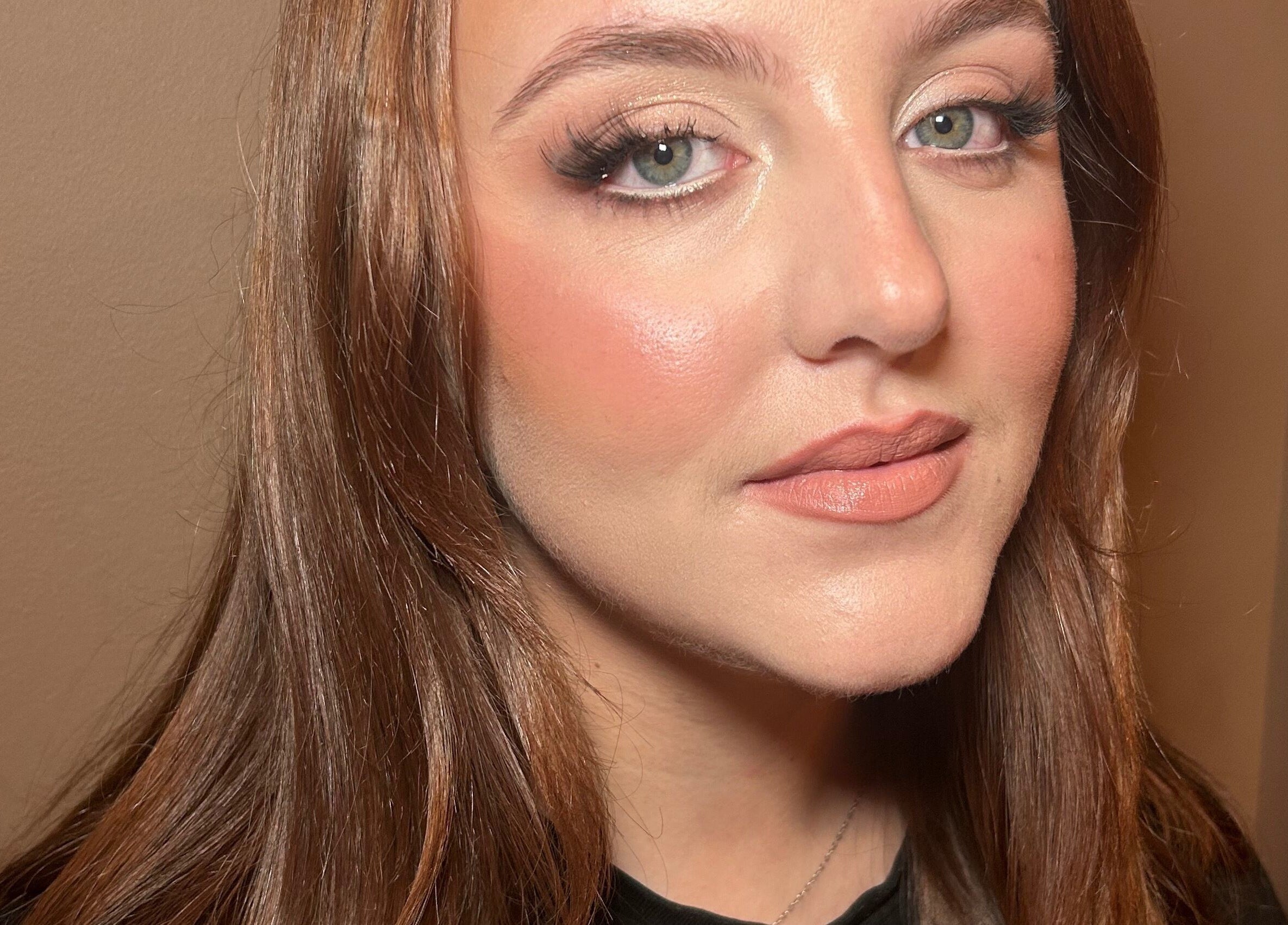 Elegant makeup look by Hannah Kathleen, Birmingham, England, GB. Highlighted complexion and natural lip color.