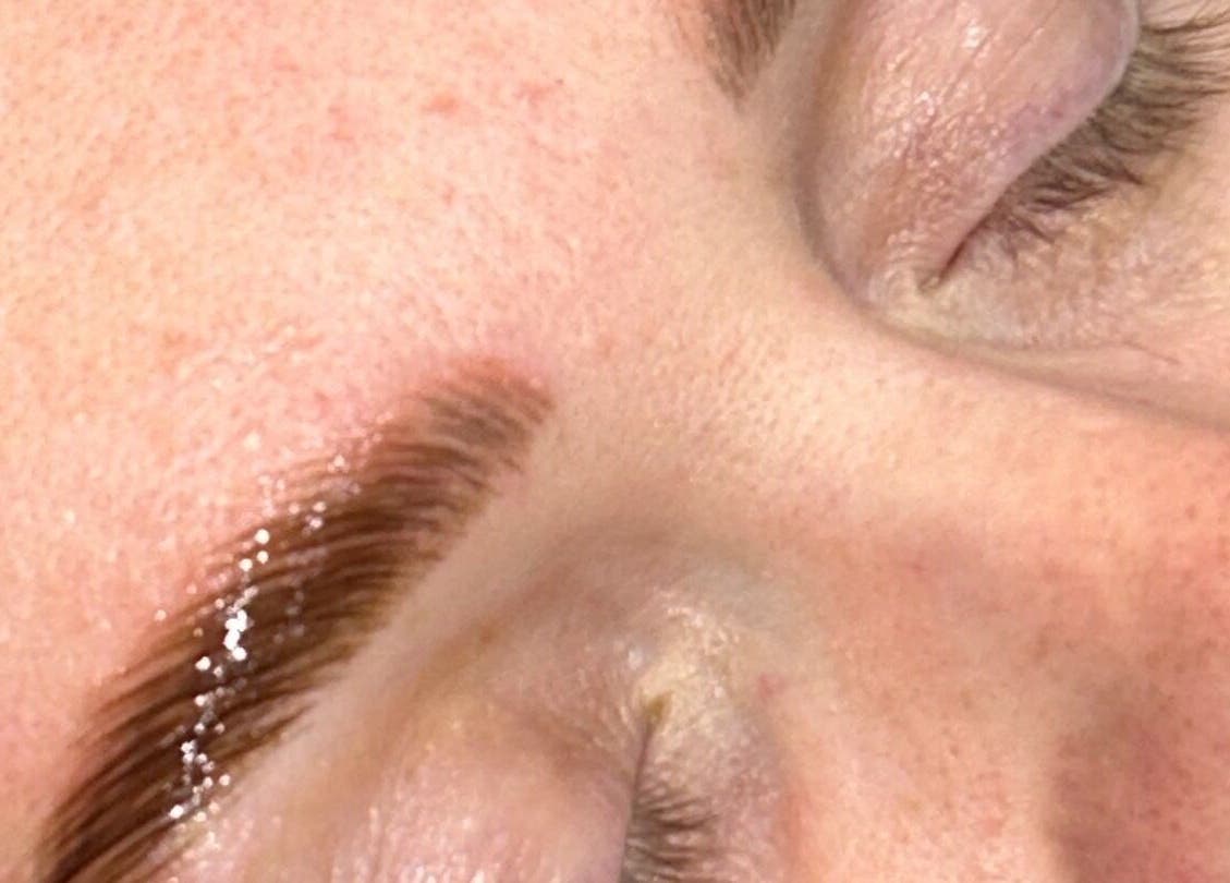 Closeup of expertly styled eyebrows at Hannah Kathleen, Birmingham, England, GB, showcasing perfect arches.