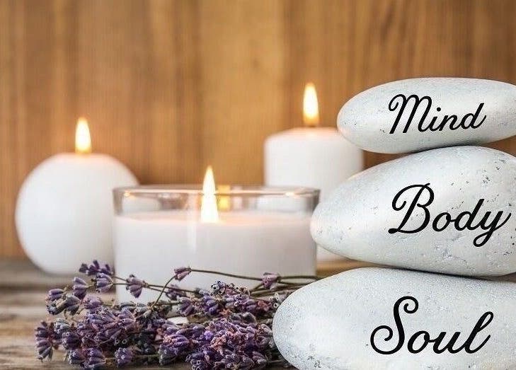 Candles and stones with 'Mind, Body, Soul' at Therapy & Flow, Birmingham, England, GB.