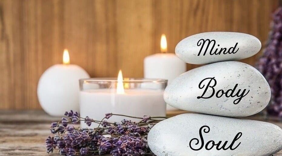 Candles and stones with 'Mind, Body, Soul' at Therapy & Flow, Birmingham, England, GB.