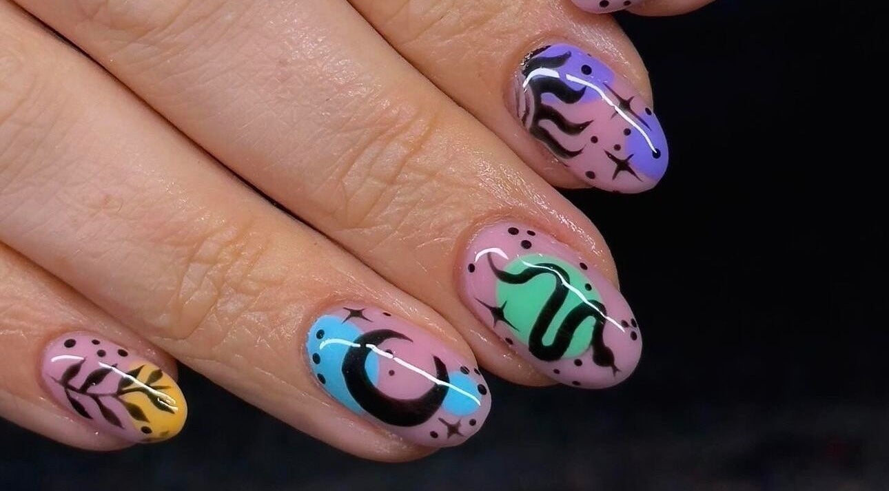 Unique nail art design at Carla Emily Nails, Pontnewynydd, Wales, GB, showcasing vibrant colors and creative patterns.