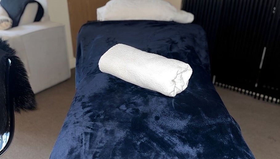 Plush massage table at The Body Massage Guru in Manchester, England, GB exudes relaxation and luxury.