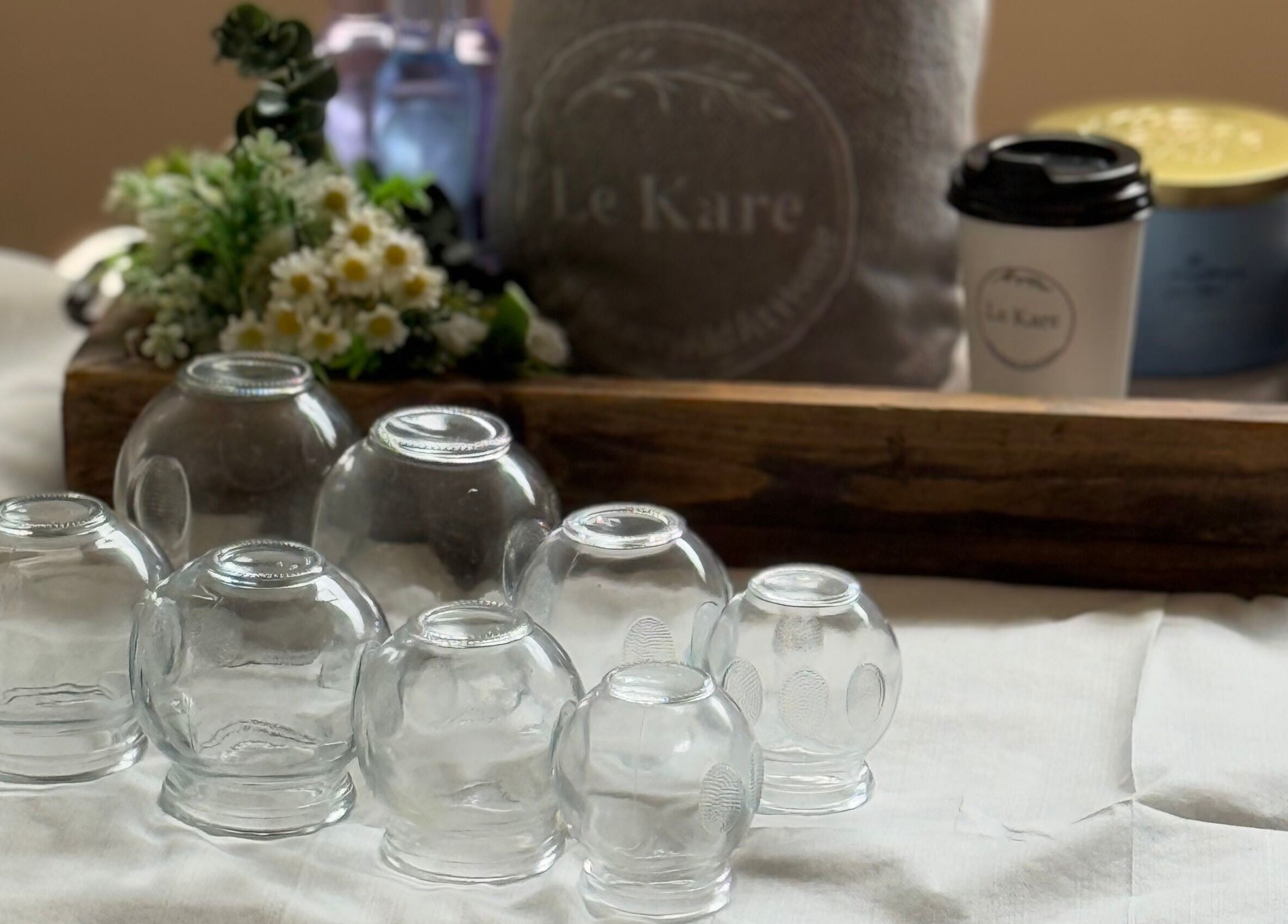 Glass cups and spa decor at Le Kare Spa - Home Service Jeddah, Jeddah, SA. Offering tranquil wellness services.