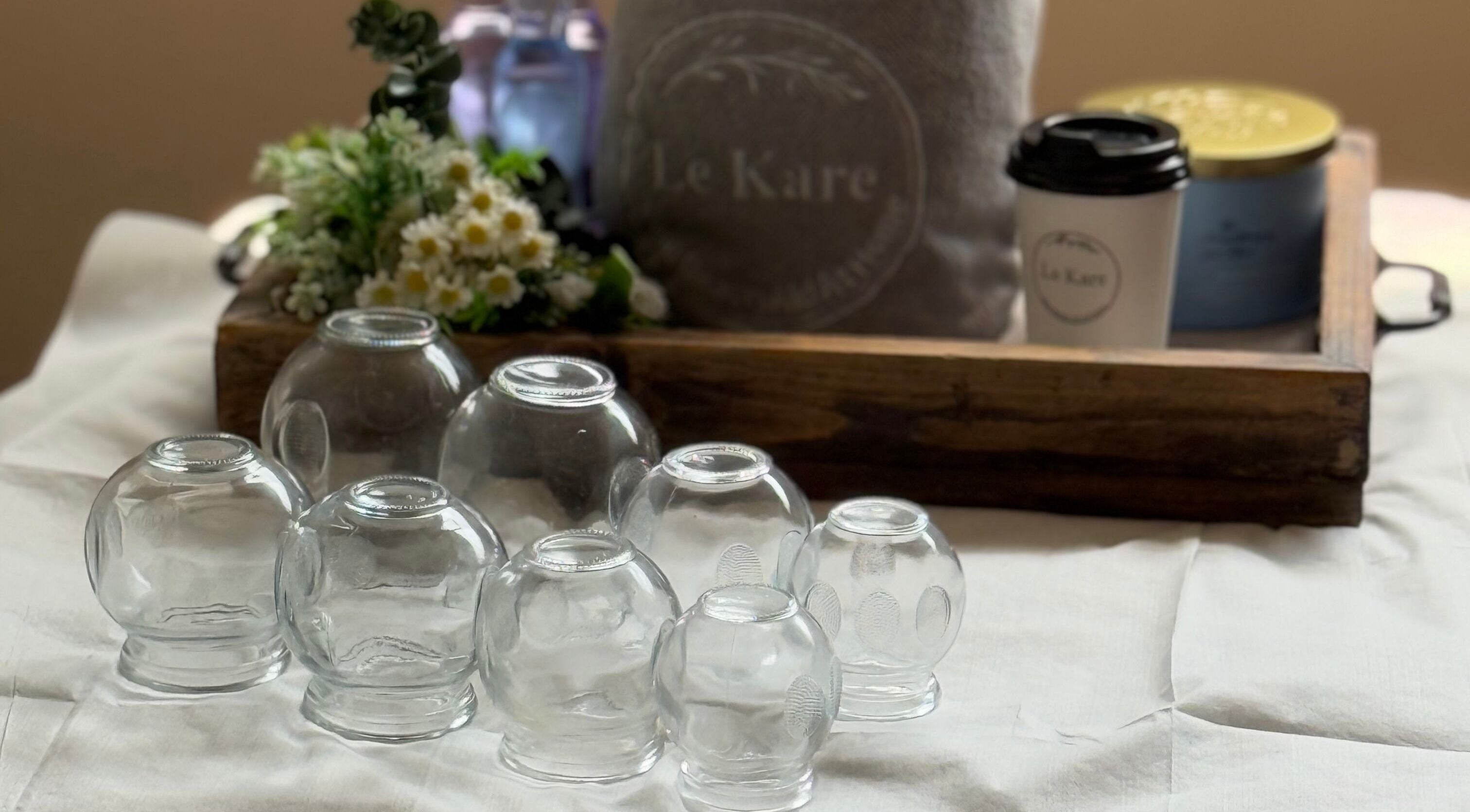 Glass cups and spa decor at Le Kare Spa - Home Service Jeddah, Jeddah, SA. Offering tranquil wellness services.