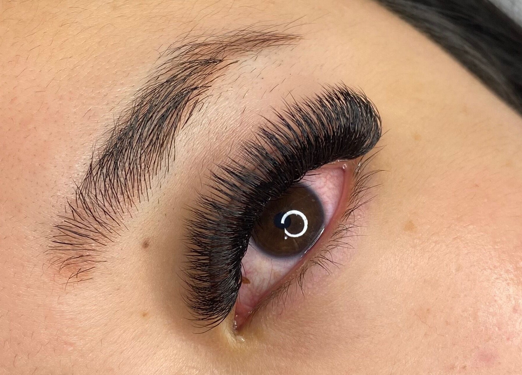 Close-up of expertly applied eyelash extensions at Lashed by Linda, Middleton Grange, New South Wales, AU.