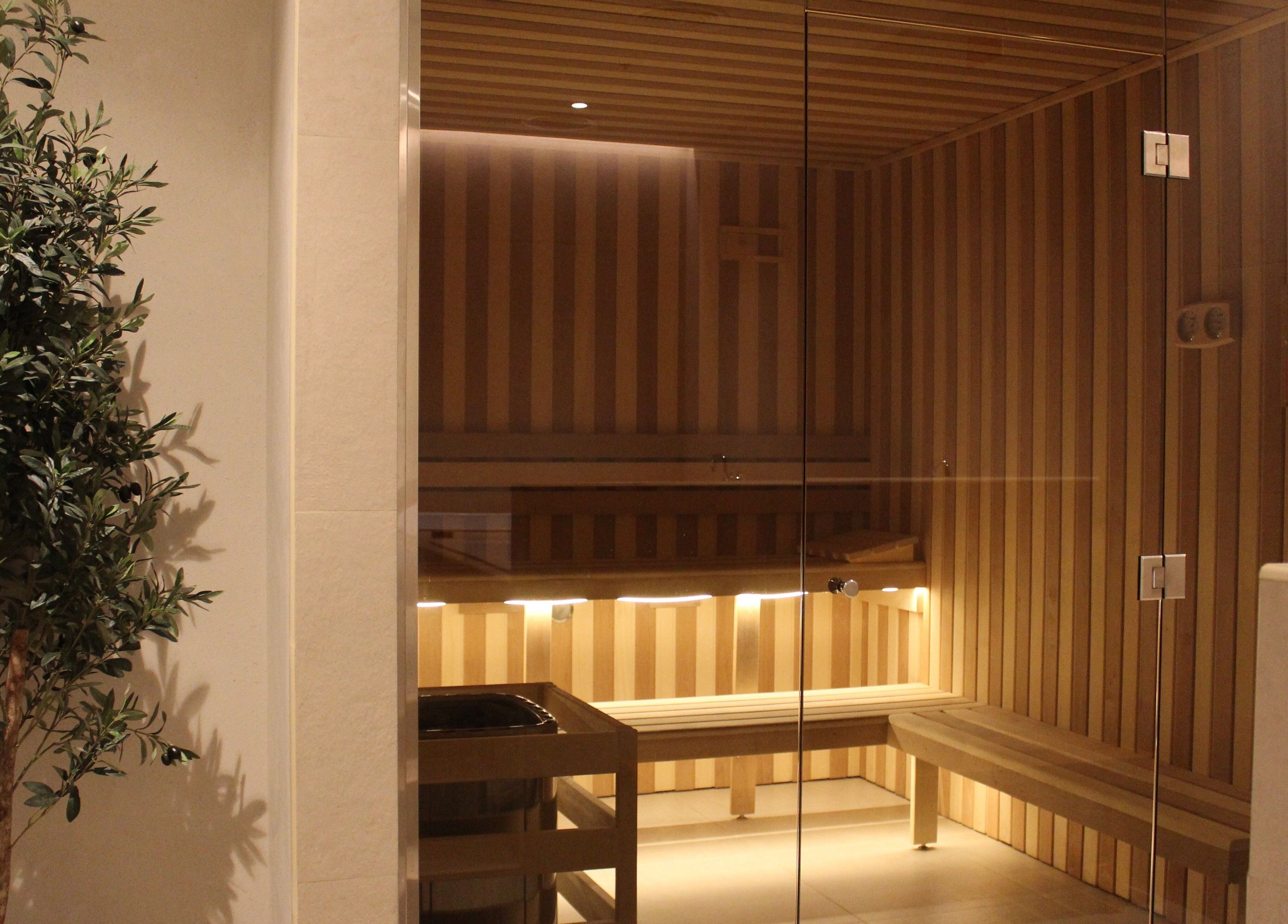 Luxurious sauna at Contrast JVC, دبي, دبي, AE, featuring elegant wooden interiors and warm ambiance.