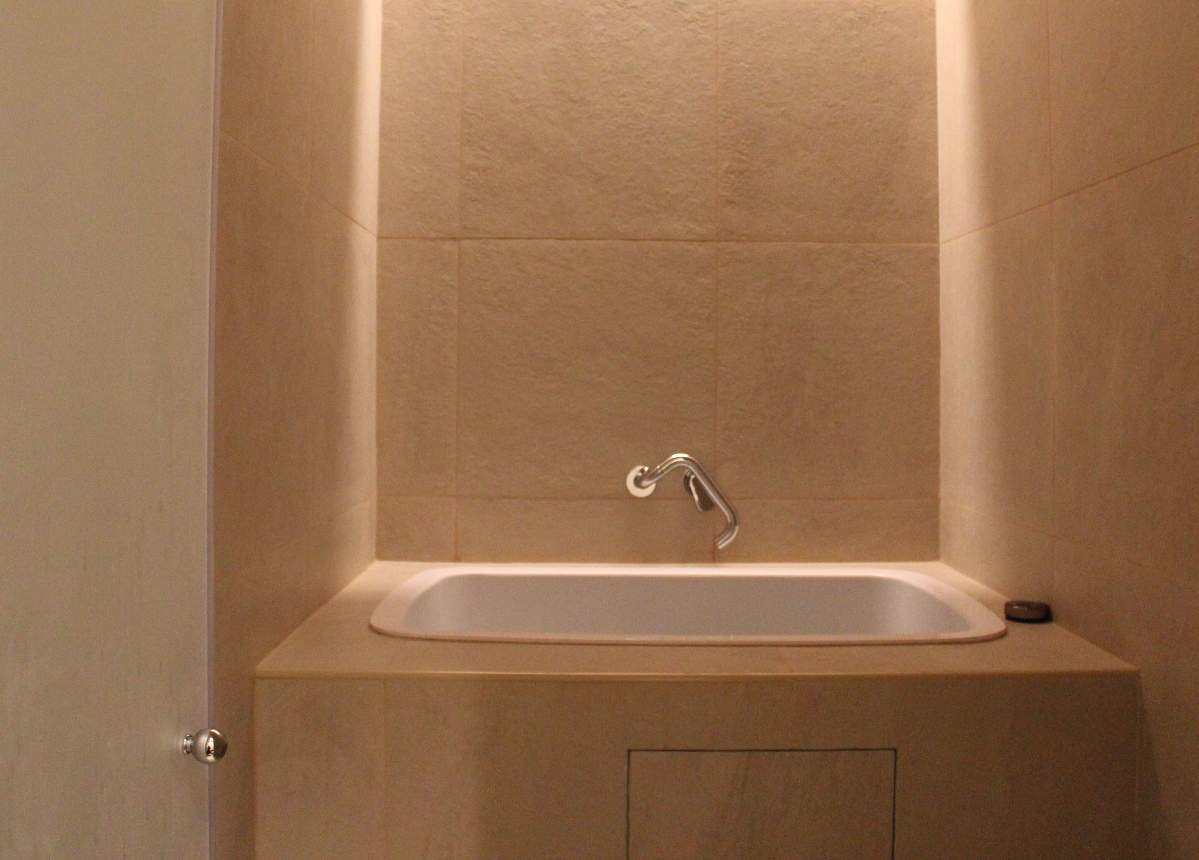 Luxurious spa bath area at Contrast Dubai Creek Harbour, Dubai, Dubai, AE with elegant lighting and modern design.