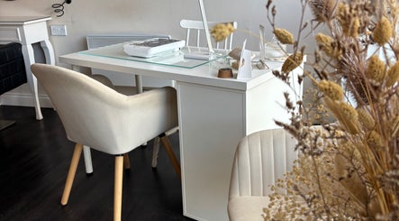Stylish nail salon seating at Inspire Nails, Studley, England, GB with modern decor.