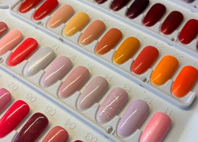 Colorful nail polish samples at Inspire Nails, Studley, England, GB offer vibrant choices for unique manicures.