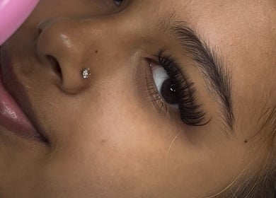 Close-up of elegant lashes at Deebeautystop, London, England, GB highlighting beauty services.