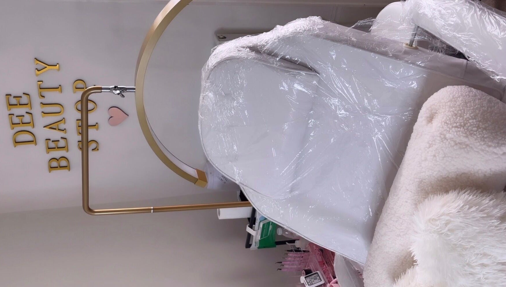 Luxurious treatment chair at Deebeautystop, London, England, GB, showcasing comfort and style.