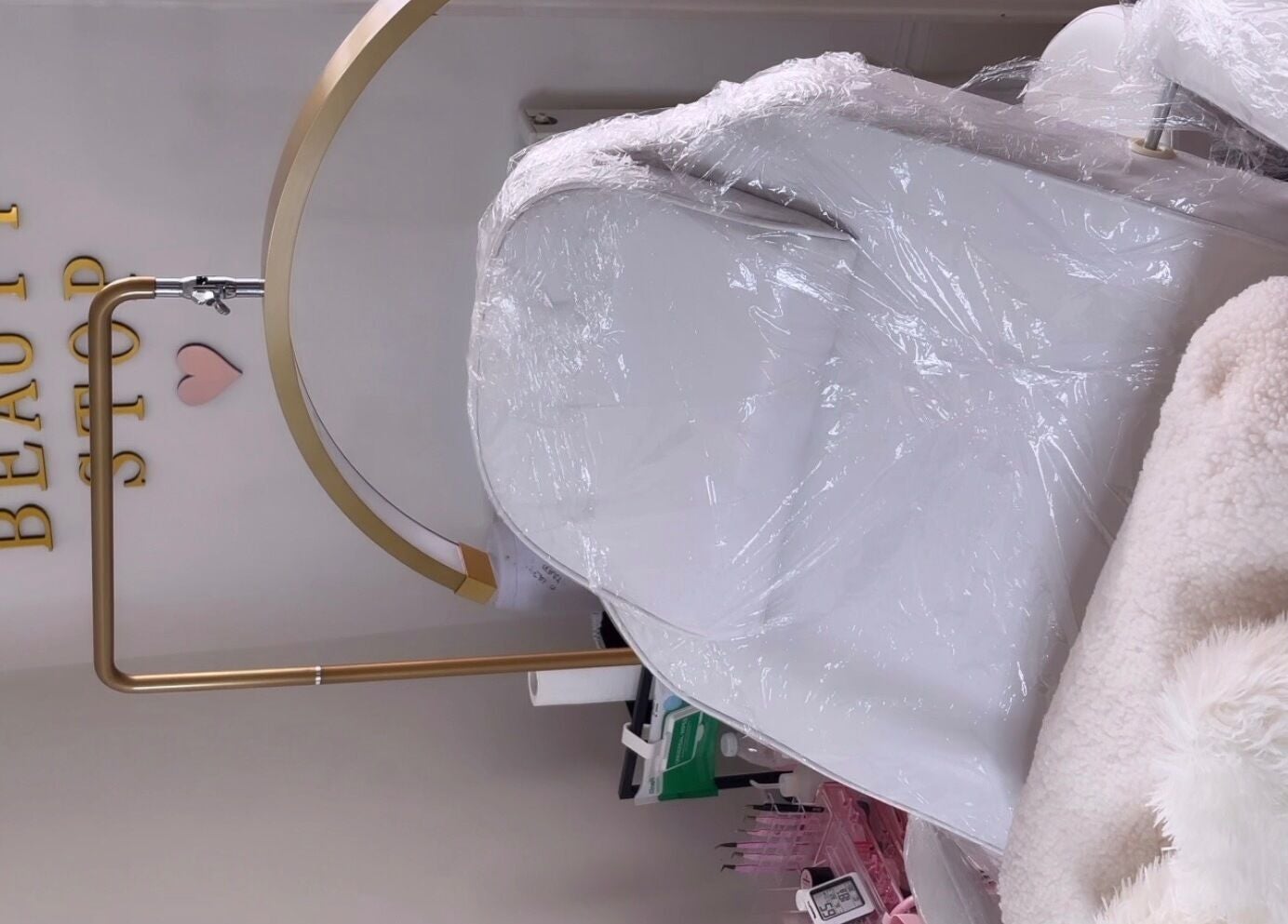 Luxurious treatment chair at Deebeautystop, London, England, GB, showcasing comfort and style.