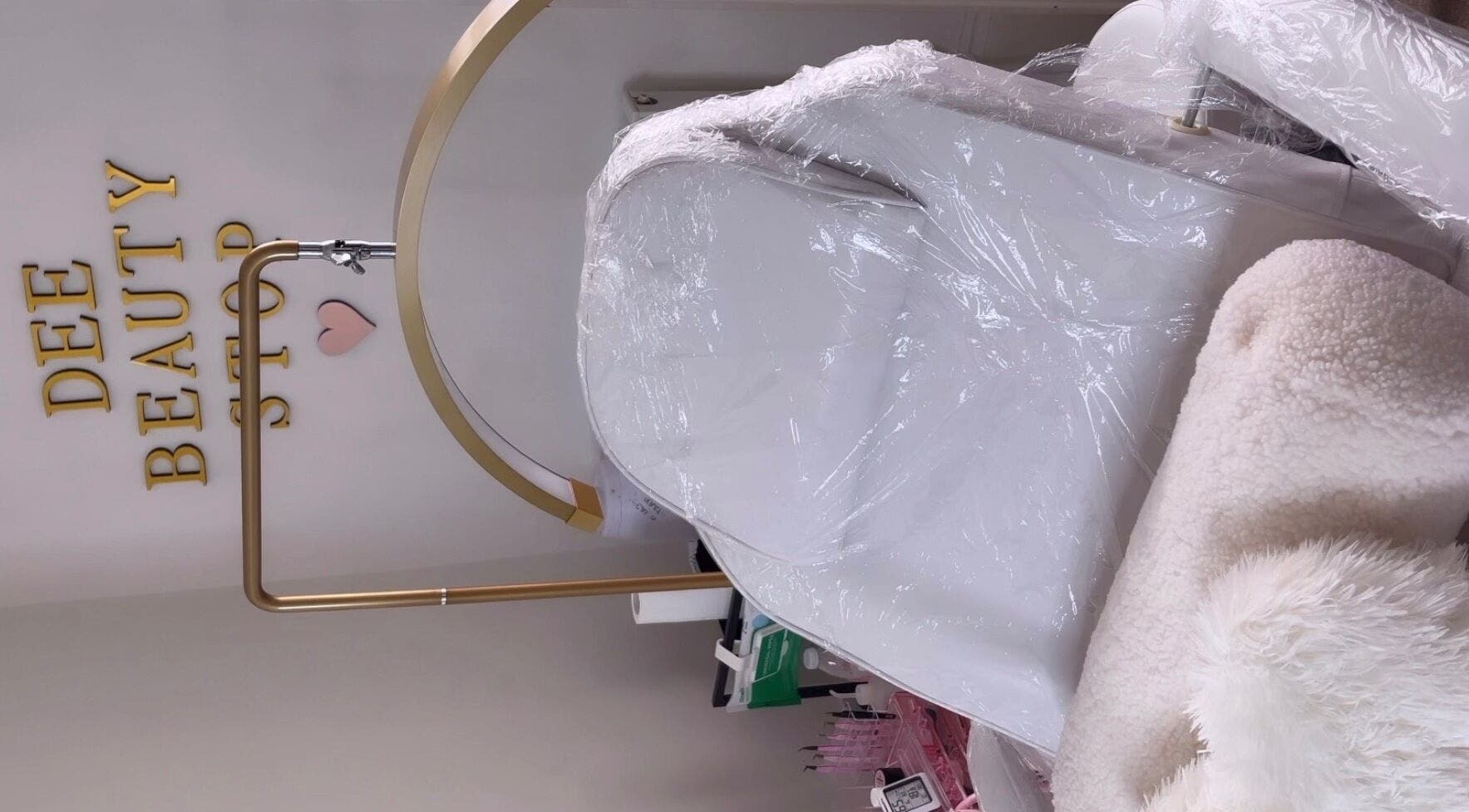 Luxurious treatment chair at Deebeautystop, London, England, GB, showcasing comfort and style.