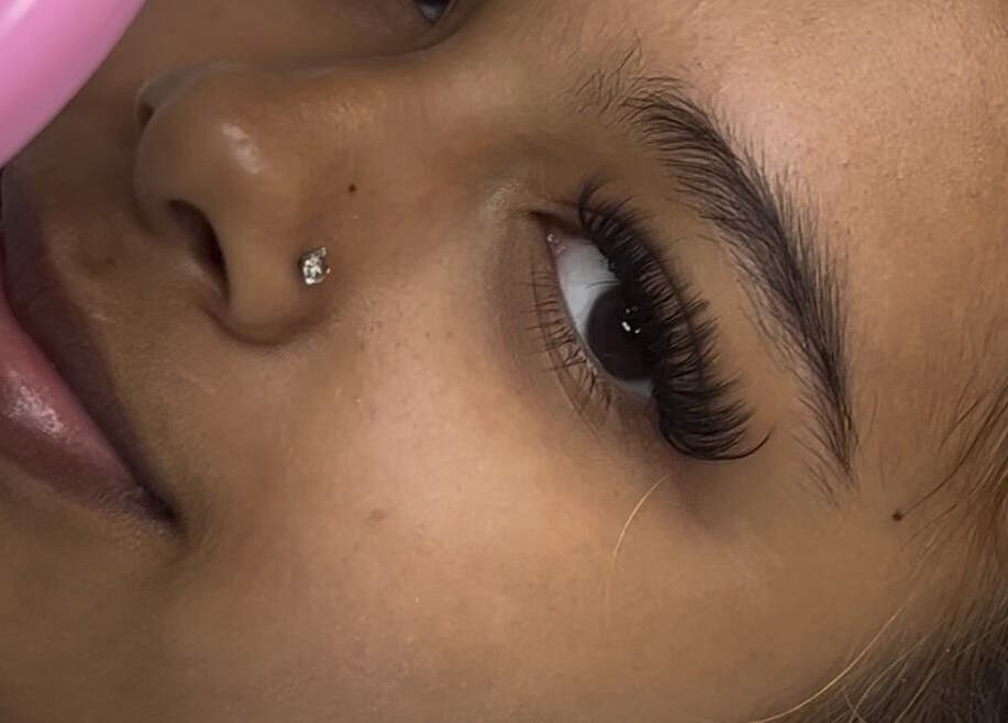 Close-up of lush eyelashes at Deebeautystop, London, England, GB showcasing expert beauty care.