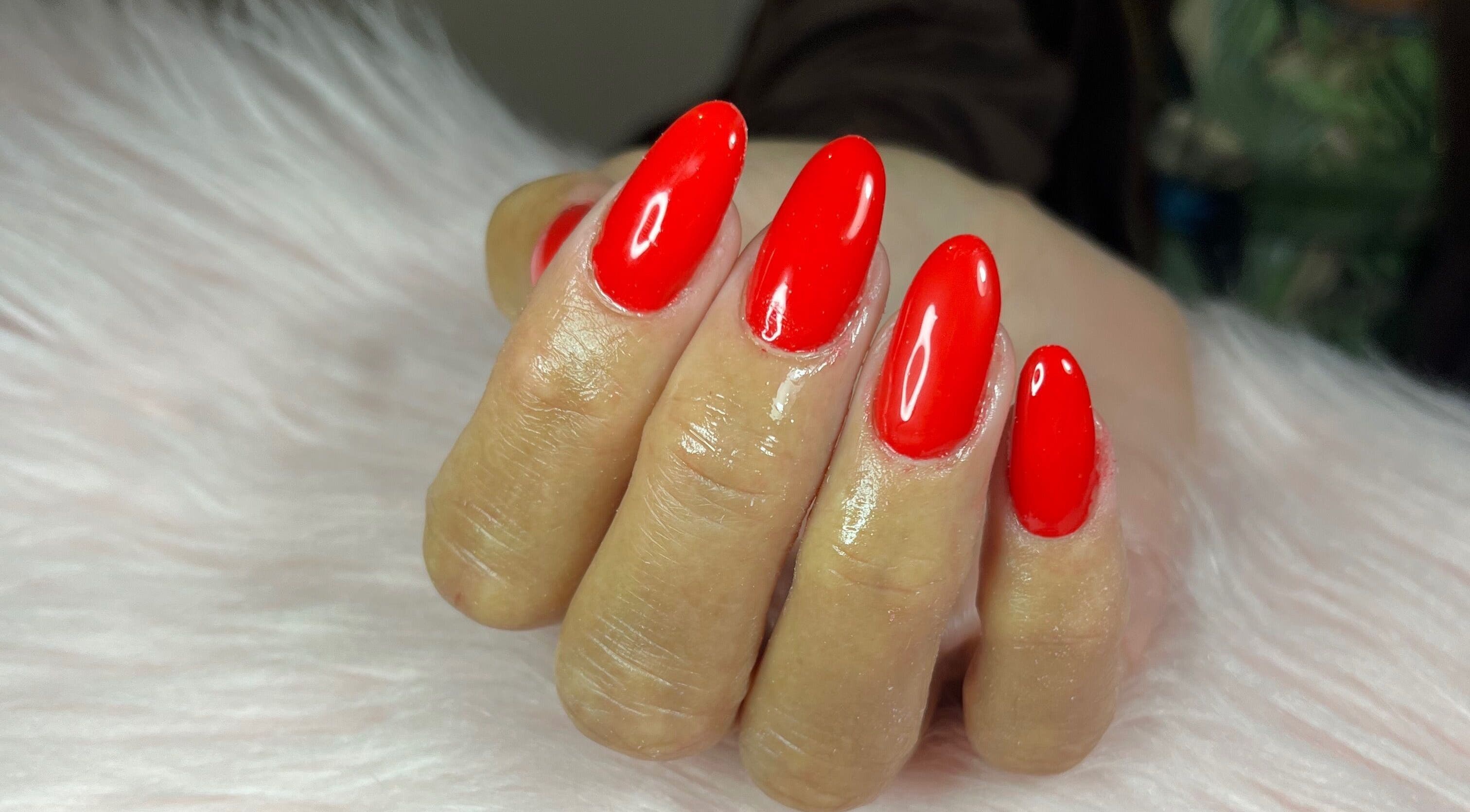 Vibrant red manicured nails by Nails by Freya in Prestatyn, Wales, GB, showcasing expert nail artistry.