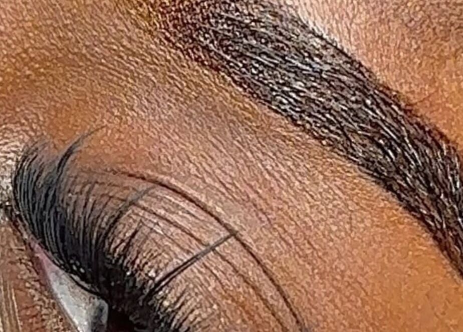 Close-up of well-groomed eyebrow at Essence Oasis Salon and Spa, Saint John's, Saint John, AG.