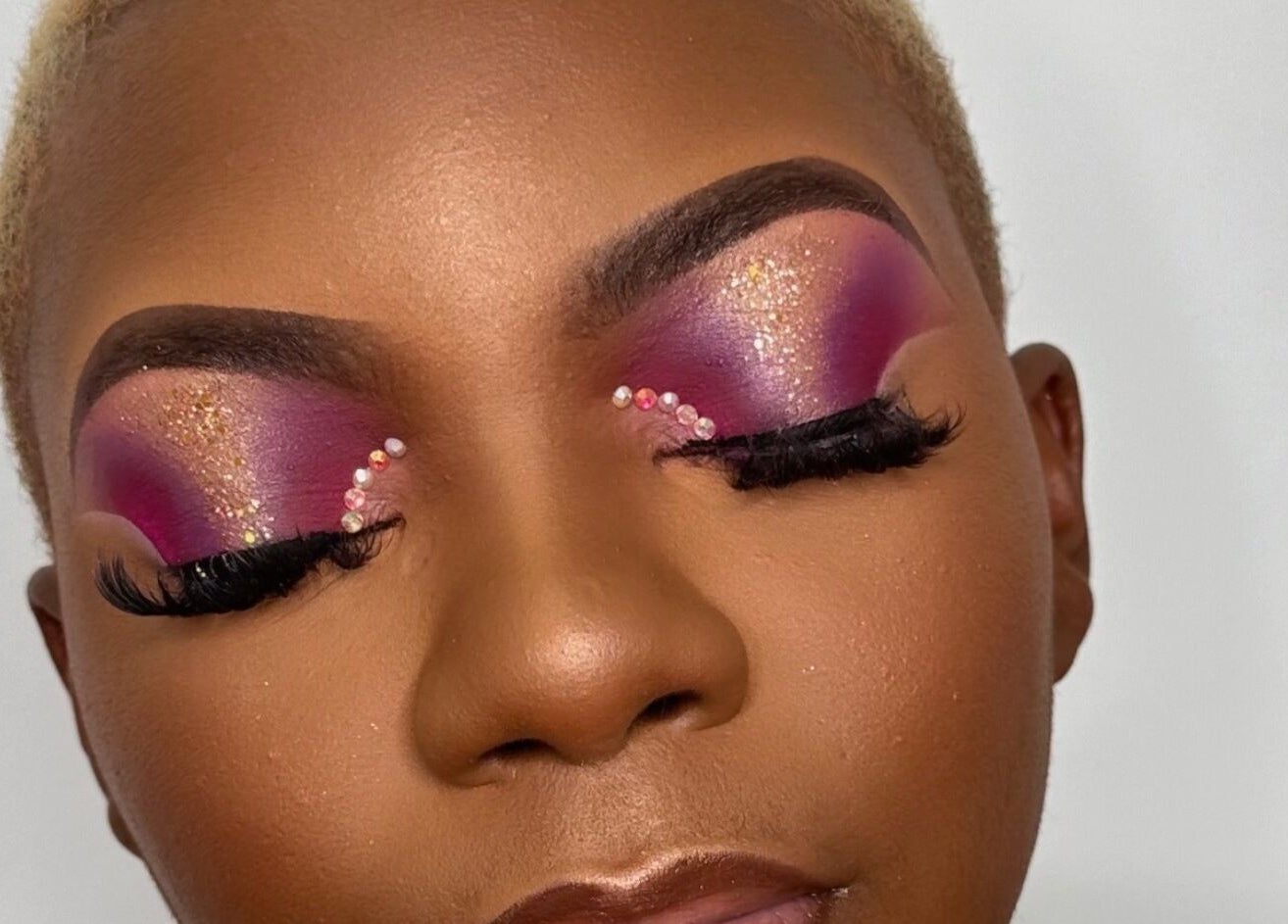 Stunning glittery eyelid makeup at Essence Oasis Salon and Spa in Saint John's, Saint John, AG.