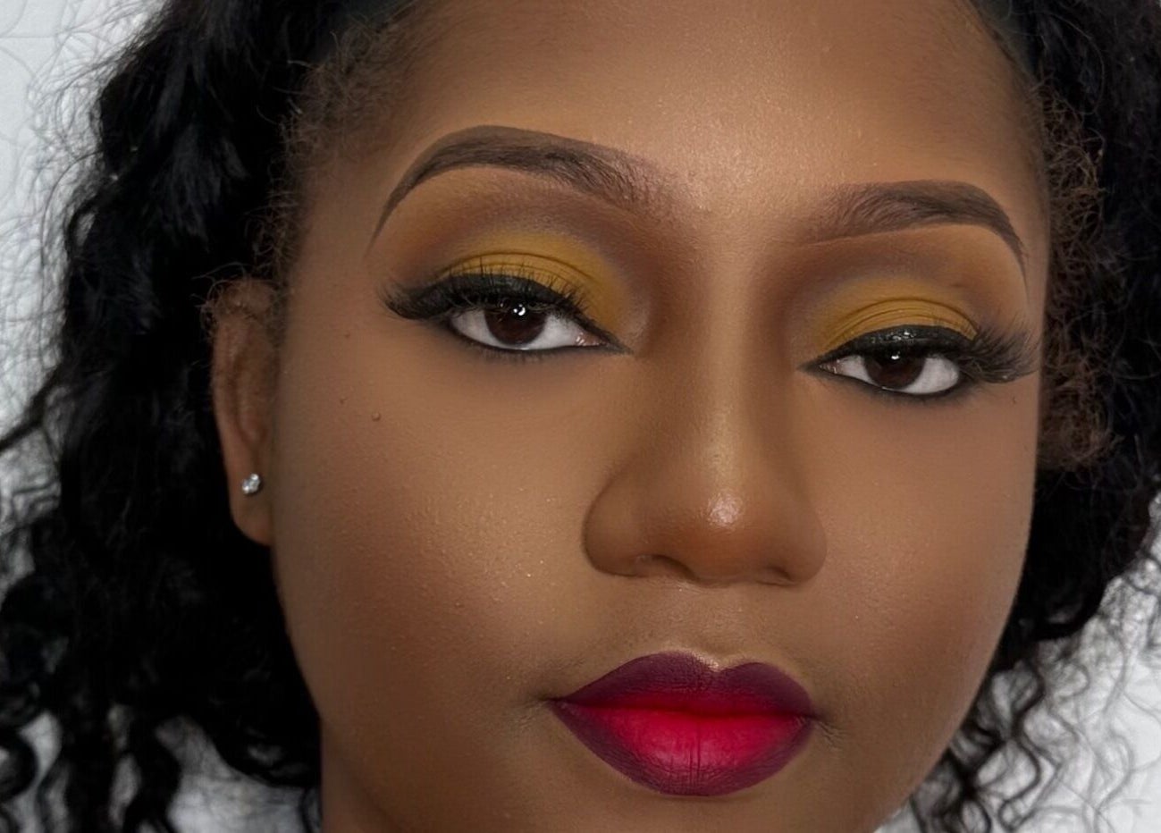 Close-up of elegant makeup at Essence Oasis Salon and Spa in Saint John's, Saint John, AG.