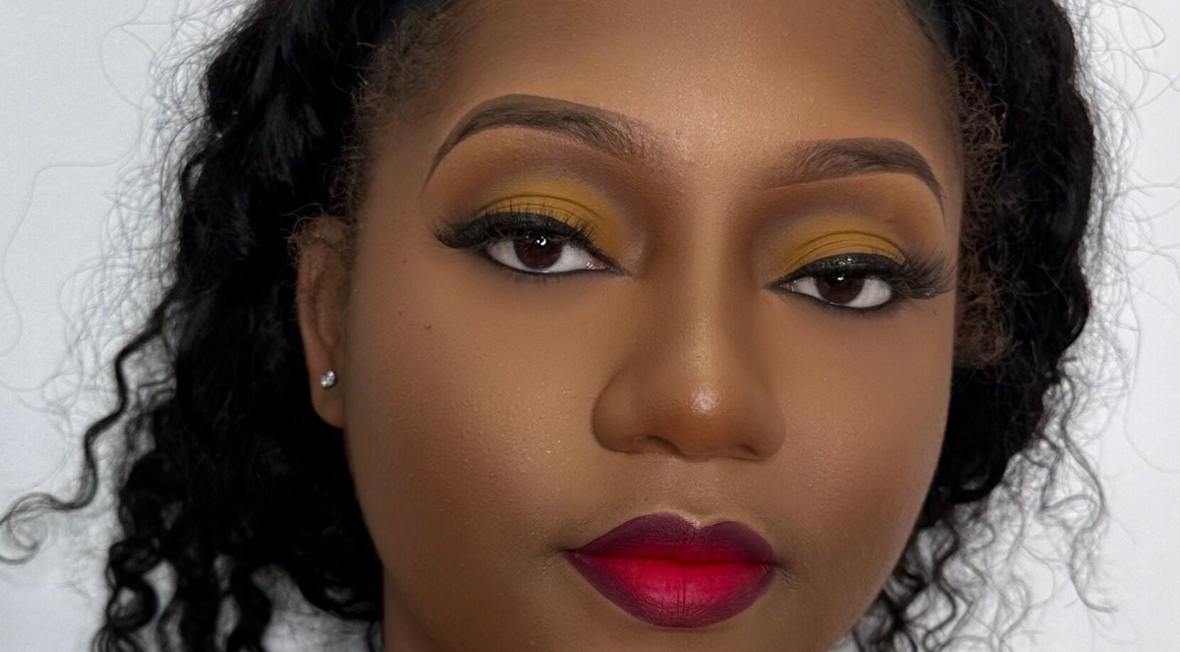 Close-up of elegant makeup at Essence Oasis Salon and Spa in Saint John's, Saint John, AG.