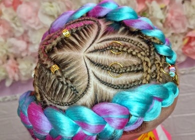Intricate braids with vibrant blue and pink colors at Cariad Beauty, Fauldhouse, Scotland, GB.