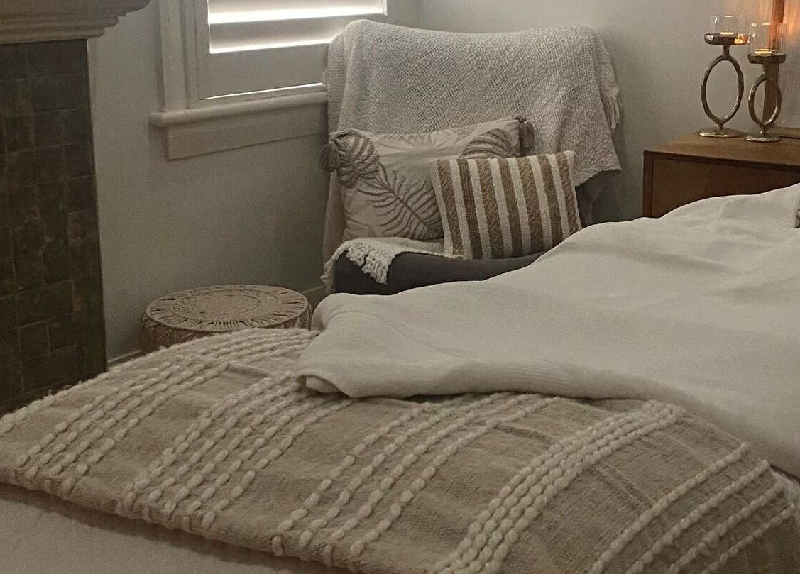 Relaxing therapy room at Circa 1929, Wagga Wagga, New South Wales, AU with elegant decor and comfortable seating.