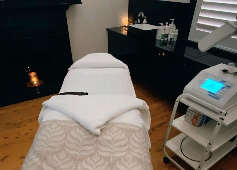 Relaxing treatment room at Circa 1929, Wagga Wagga, New South Wales, AU with spa bed and equipment.