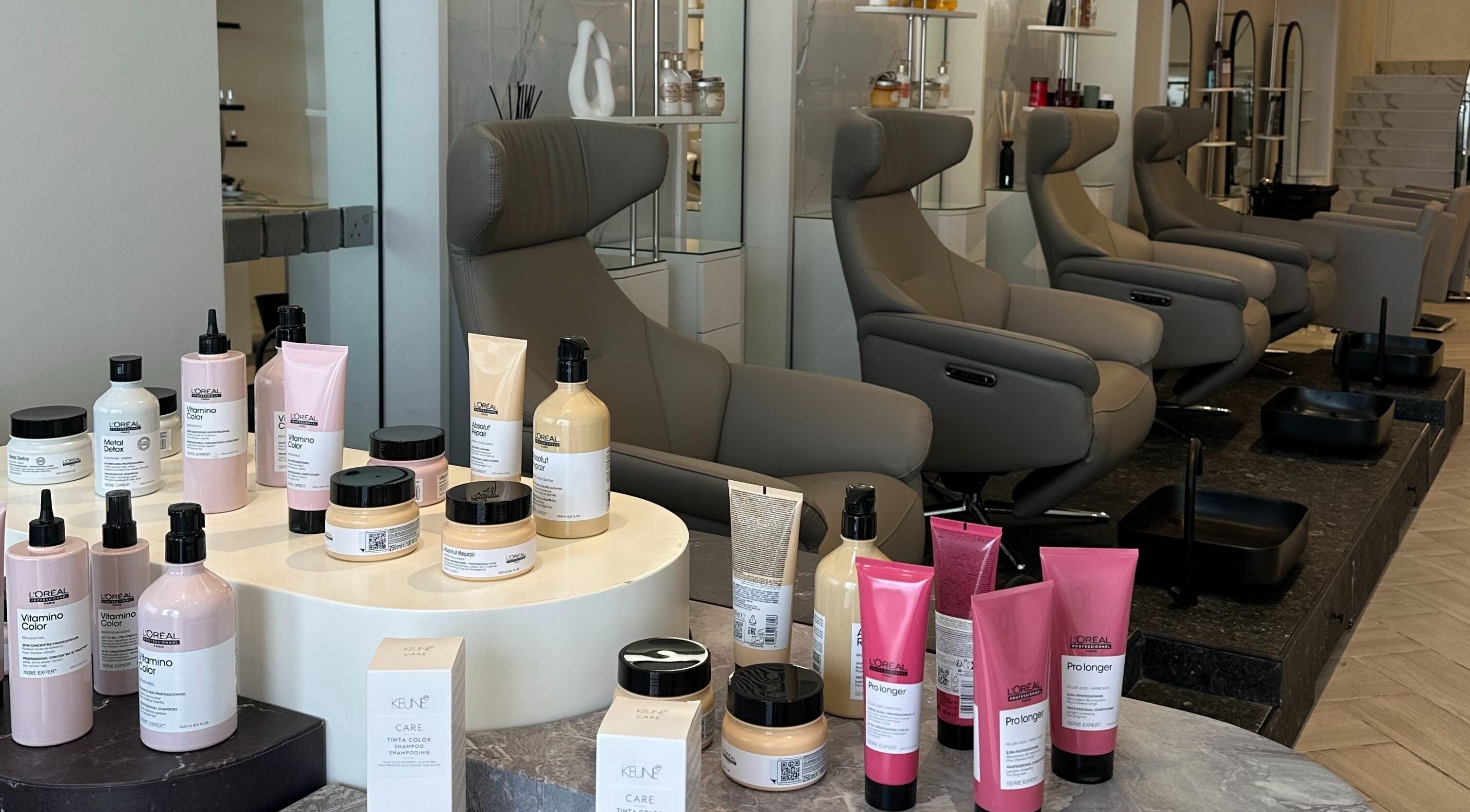 Elegant seating and beauty products display at Nomarz Beauty Lounge in Al Khobar, Eastern Province, SA.