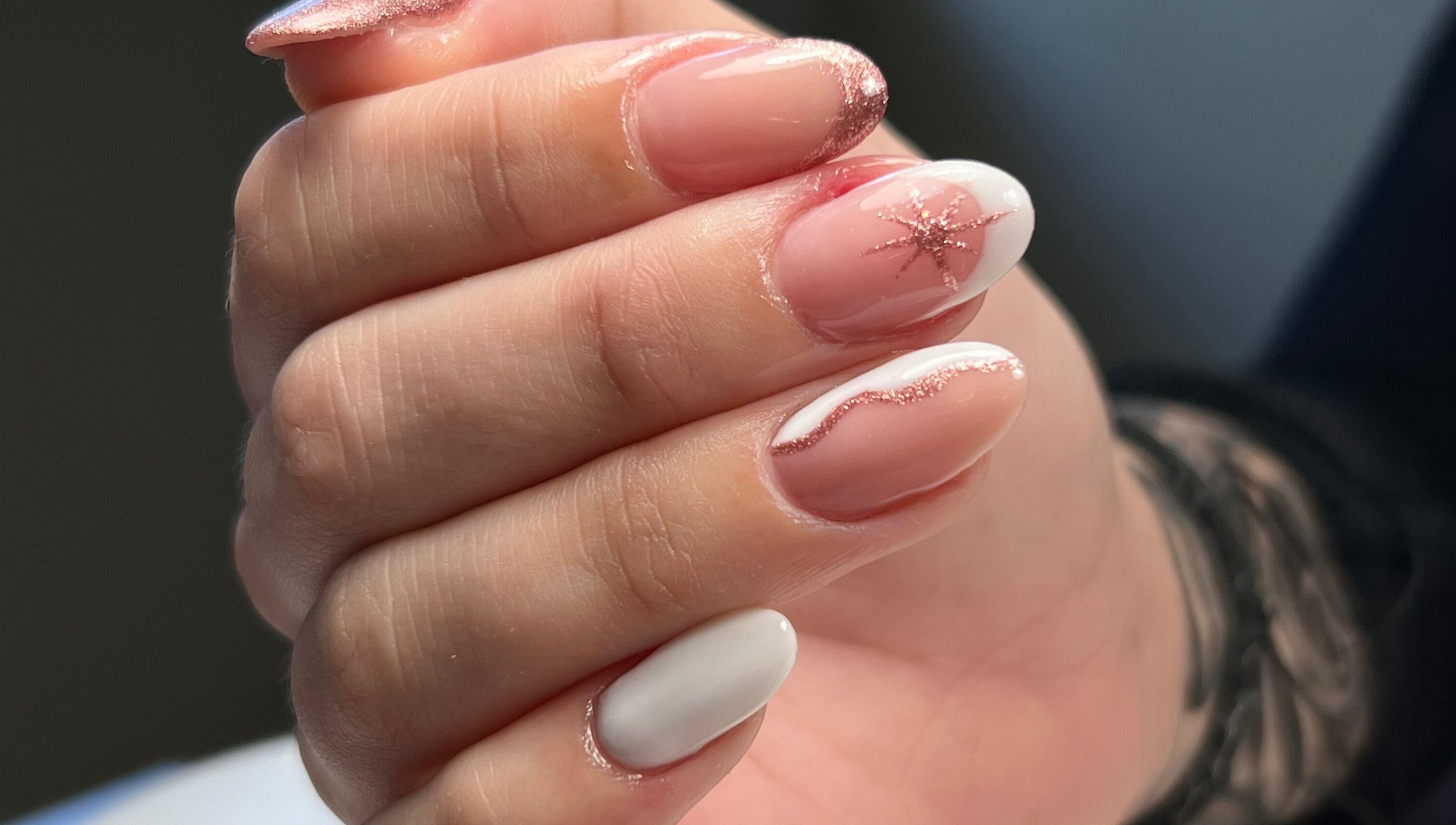 Glittering manicure at Danii Nails, Bowden, South Australia, AU. Features pink and white nails with star detail.