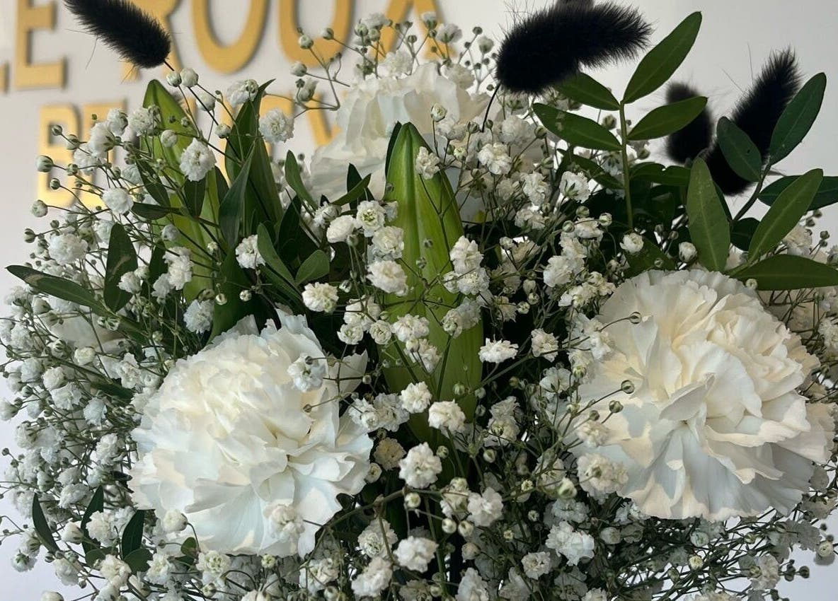Elegant white floral display at Le Roux Beauty, Langford, England, GB.