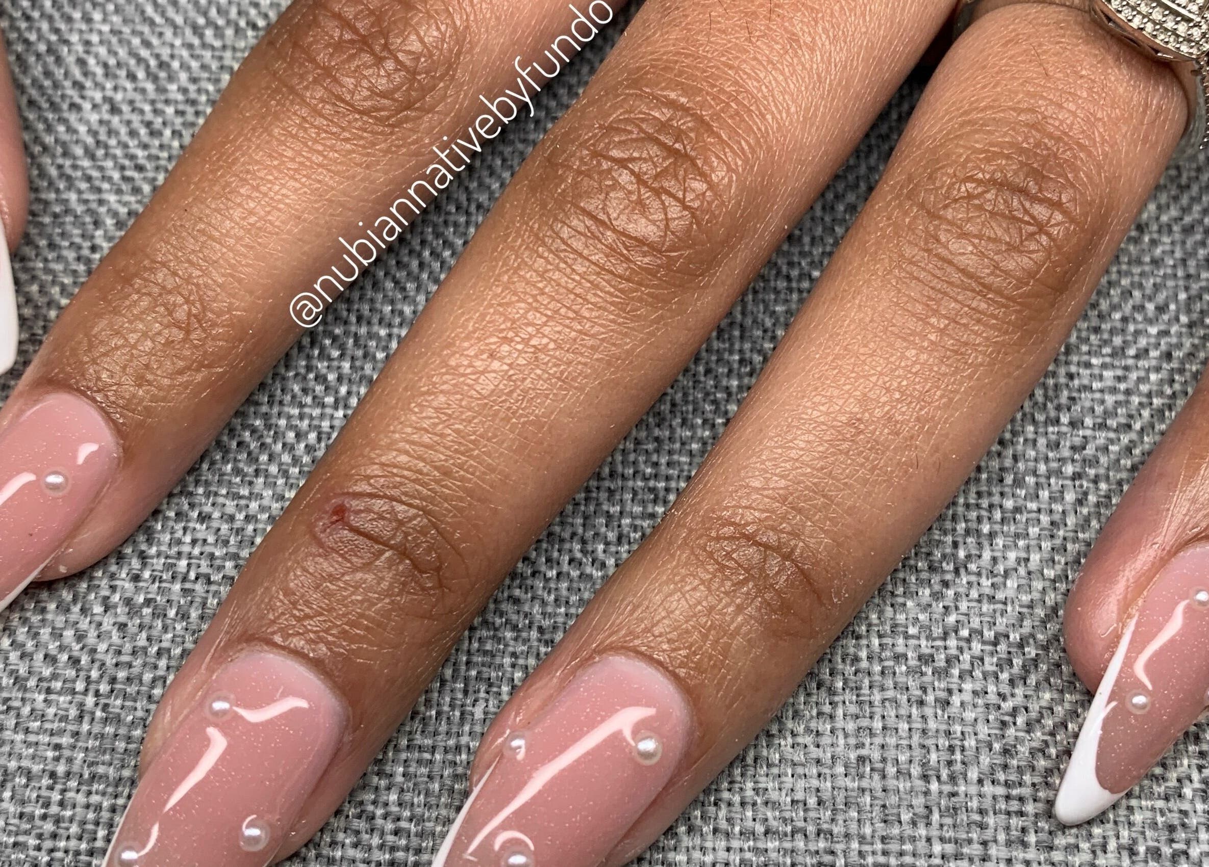 Elegant nail design with pearls by Nubian Native by Fundo, Randburg, Gauteng, ZA.