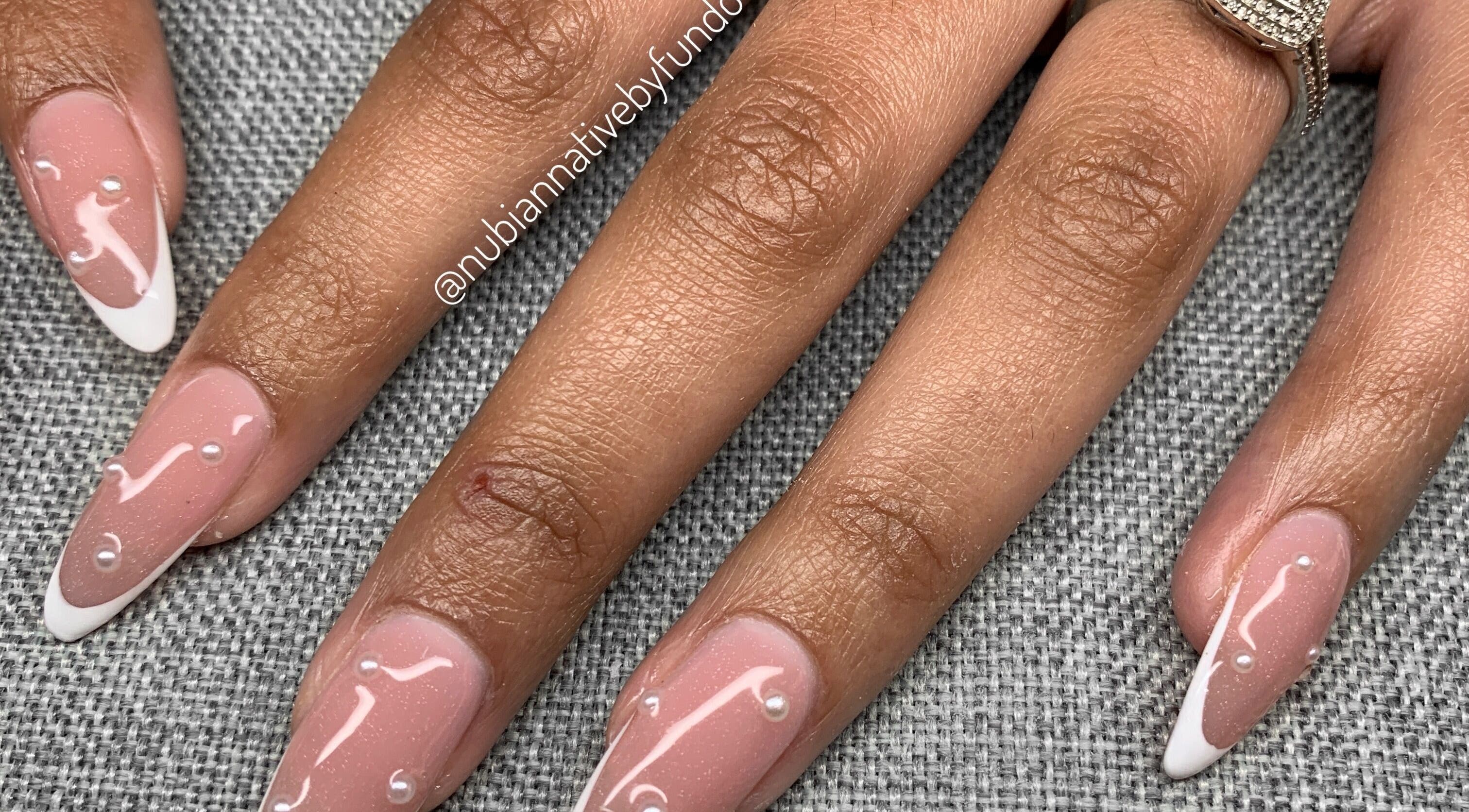Elegant nail design with pearls by Nubian Native by Fundo, Randburg, Gauteng, ZA.