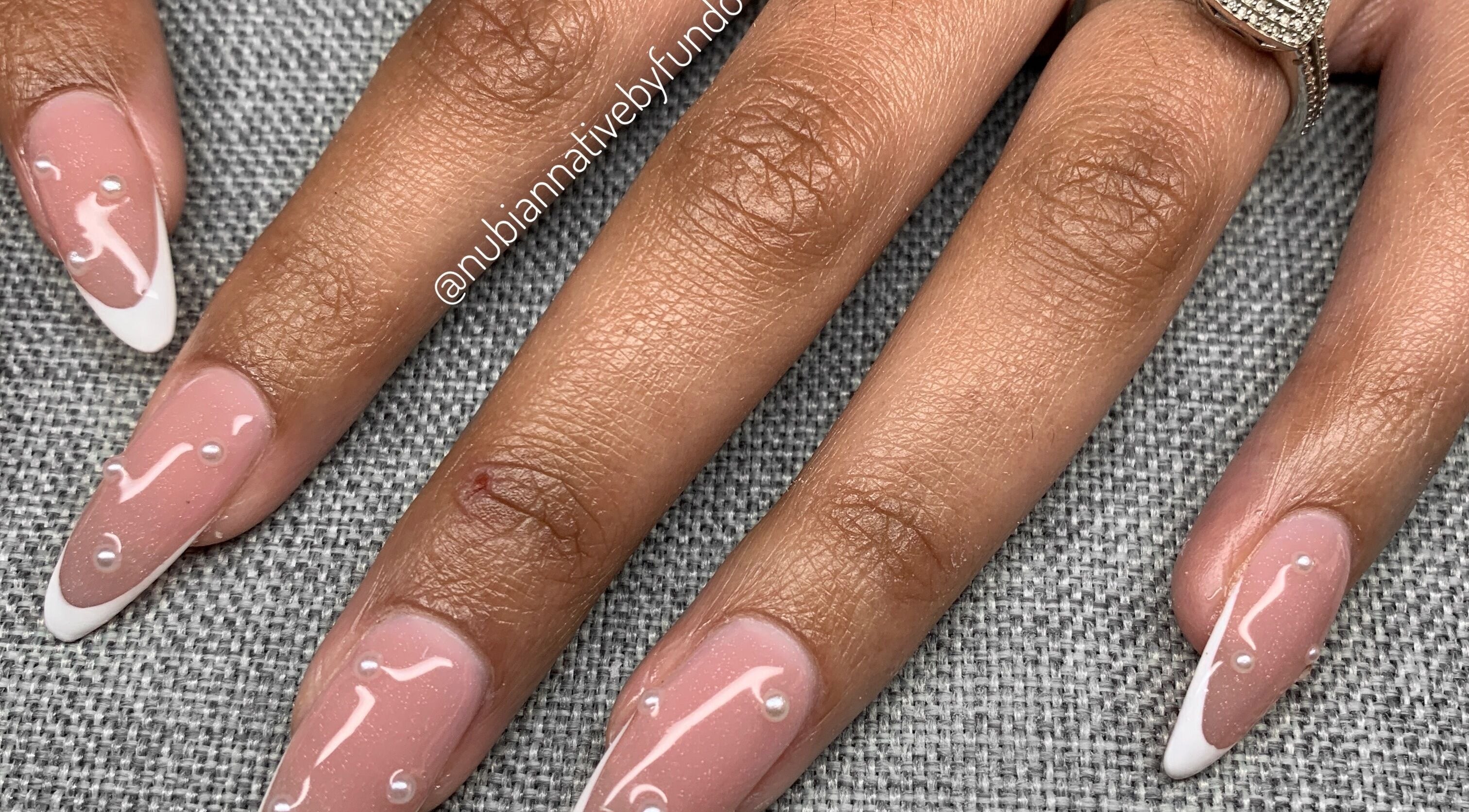Elegant nail design with pearls by Nubian Native by Fundo, Randburg, Gauteng, ZA.