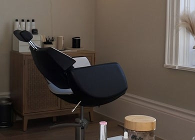Sleek salon chair at Pure Beauty & Skincare Roos, Roos, England, GB, showcasing elegant decor and modern design.