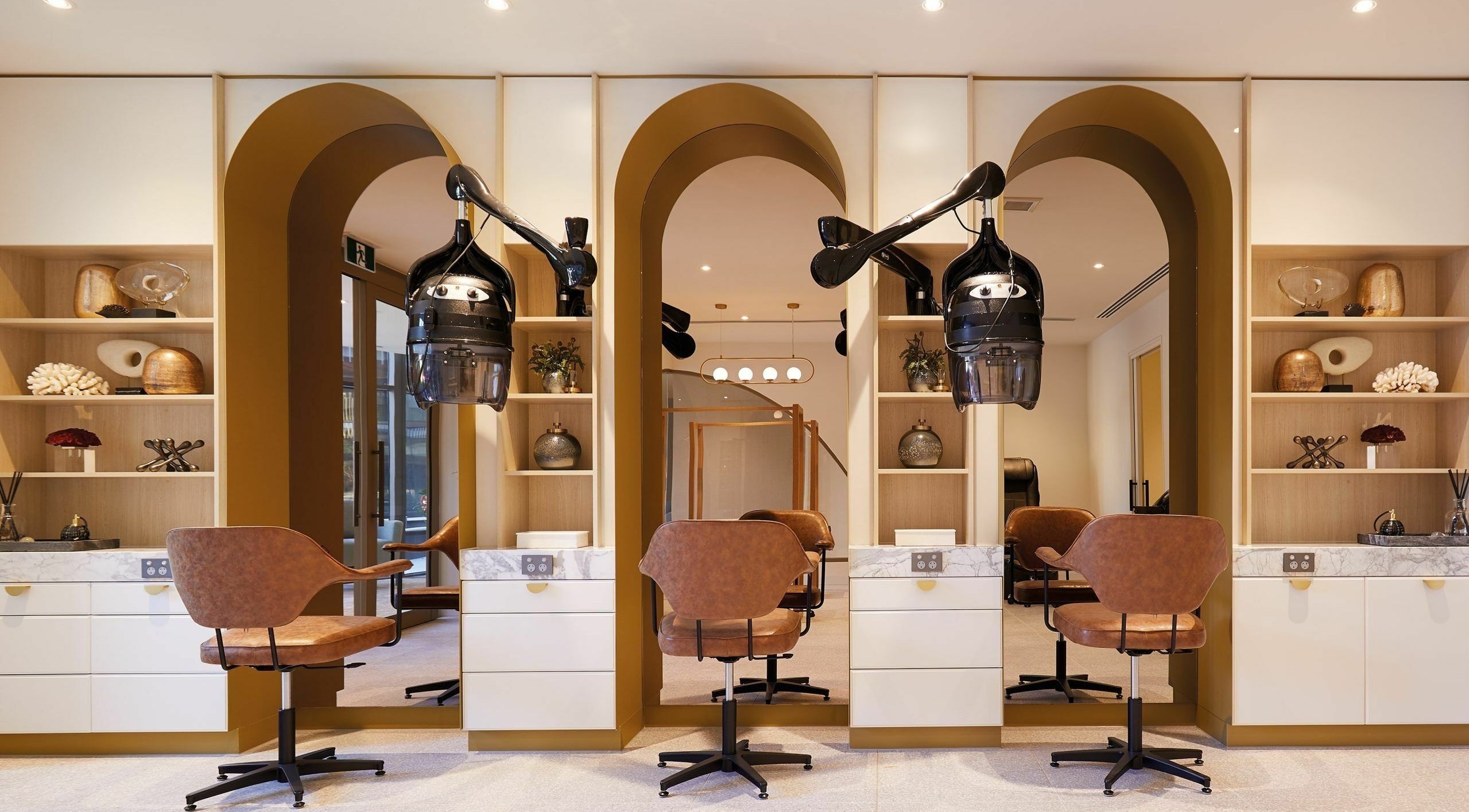 Stylish salon chairs and decor at Acacia Hair & Beauty in Glen Iris, Victoria, AU, offering a chic aesthetic.