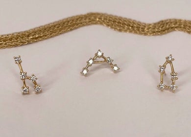 Elegant gold constellation jewelry set at Katarza, Split, Splitsko-dalmatinska Županija, HR, on display.