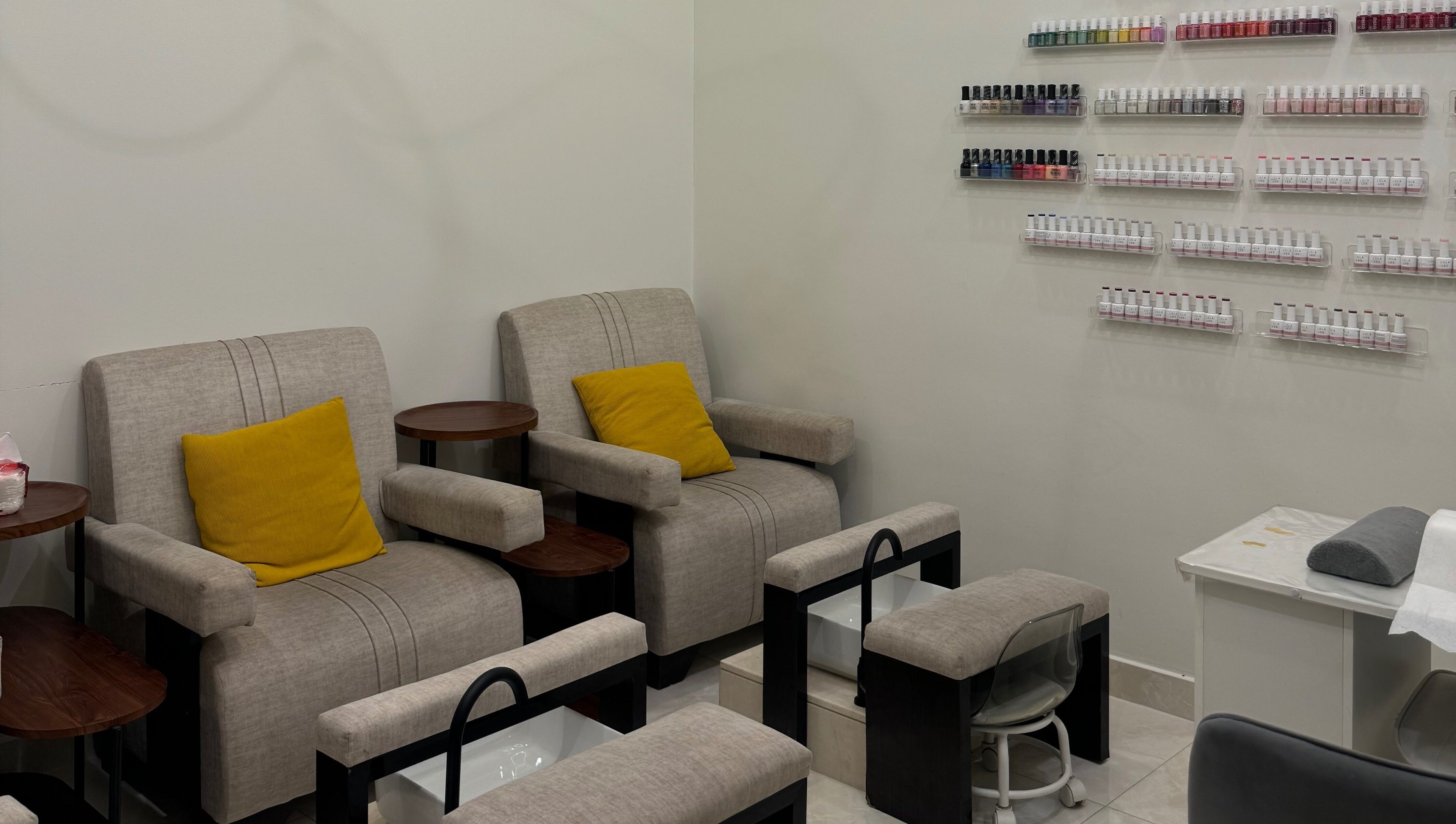 Inviting seating for nail services at Sphere Beauty Salon, Sharjah, Sharjah, AE. Relax in style.