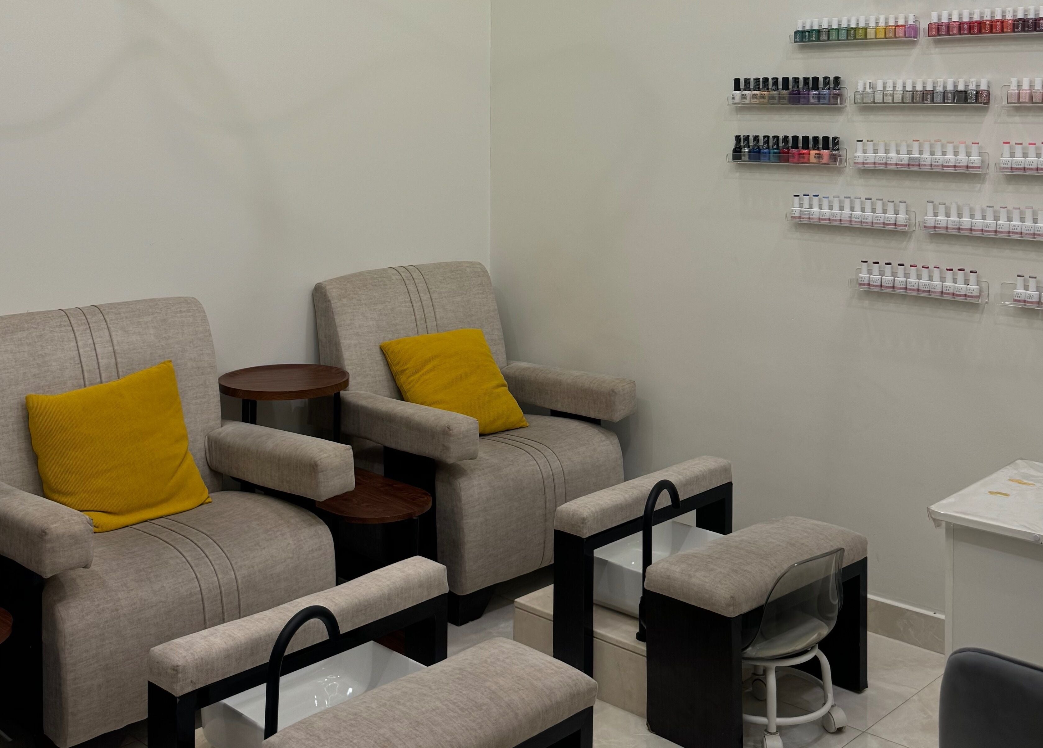 Inviting seating for nail services at Sphere Beauty Salon, Sharjah, Sharjah, AE. Relax in style.