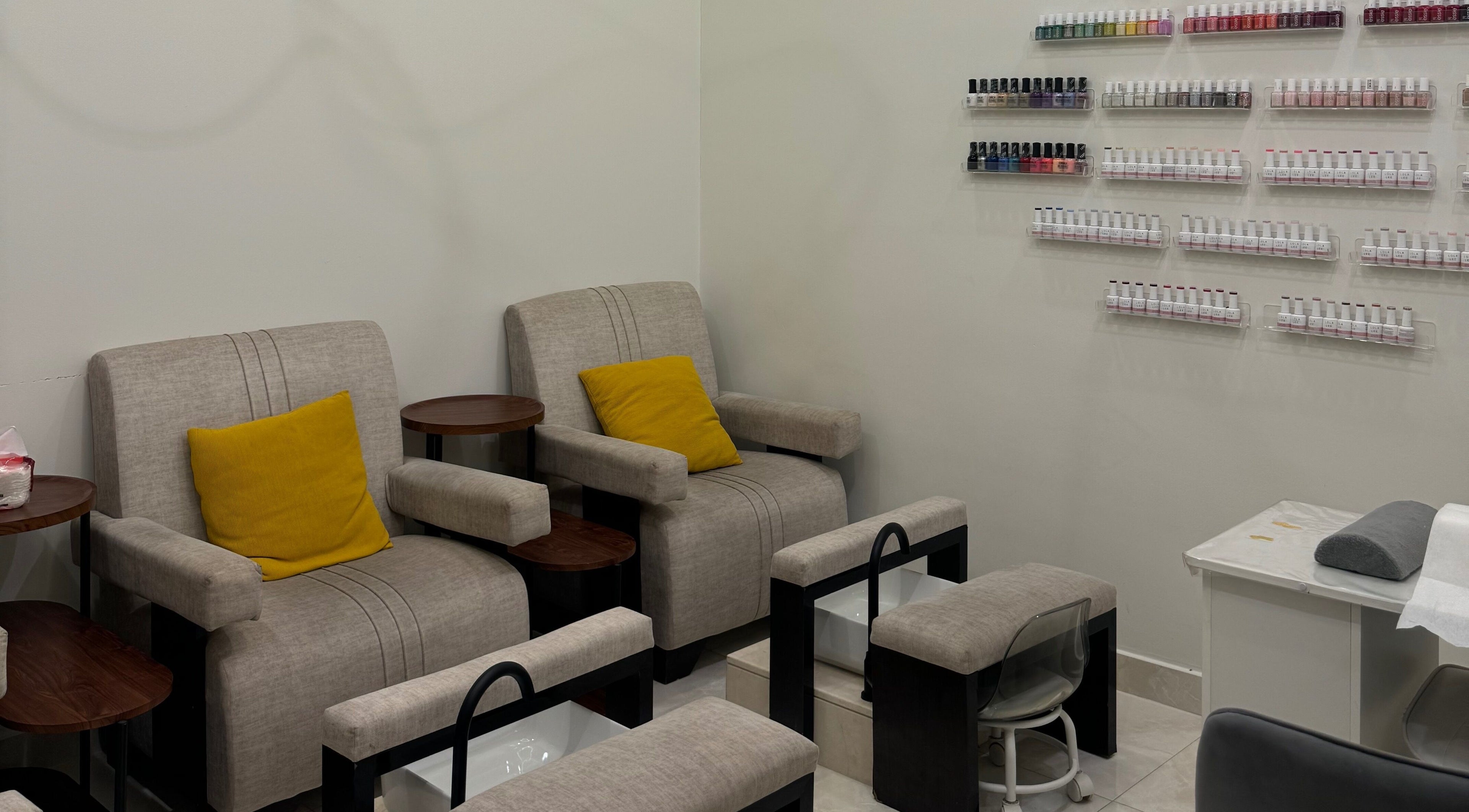 Inviting seating for nail services at Sphere Beauty Salon, Sharjah, Sharjah, AE. Relax in style.