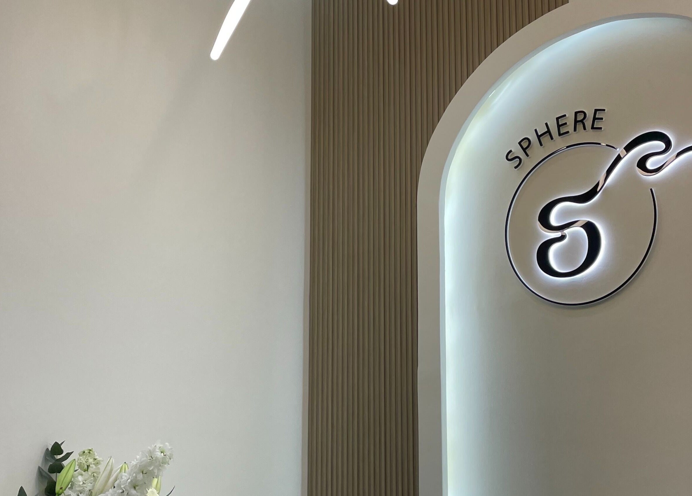 Sphere Beauty Salon entrance in Sharjah, displaying modern decor and logo.