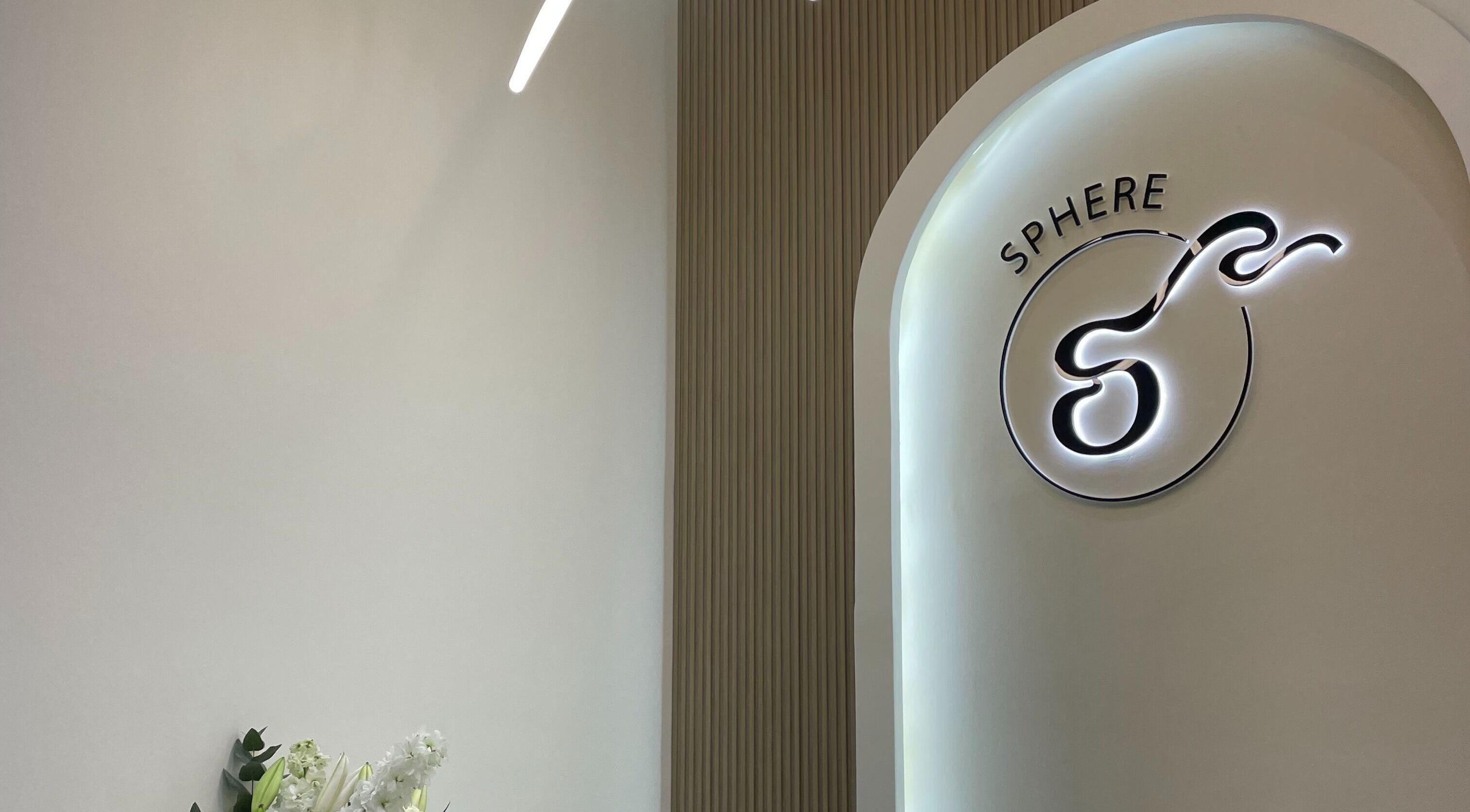 Sphere Beauty Salon entrance in Sharjah, displaying modern decor and logo.