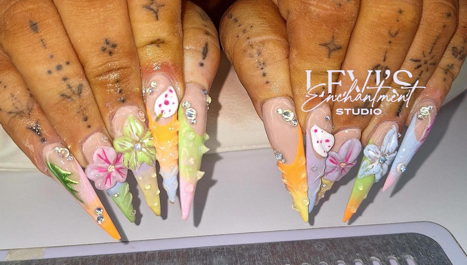 Floral nail art at Levi's Enchantment Studio in Torquay, England, GB showcasing intricate designs.
