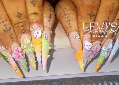 Floral nail art at Levi's Enchantment Studio in Torquay, England, GB showcasing intricate designs.