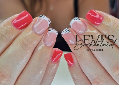 Elegant French nail design at Levi's Enchantment Studio, Torquay, England, GB. Vibrant colors and sleek finish.