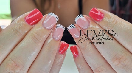 Elegant French nail design at Levi's Enchantment Studio, Torquay, England, GB. Vibrant colors and sleek finish.