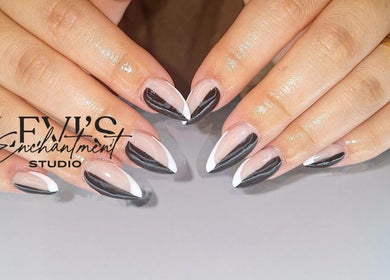 Elegant black and white nail art at Levi's Enchantment Studio, Torquay, England, GB.