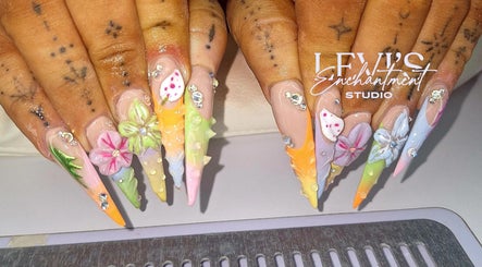 Intricate floral nail art at Levi's Enchantment Studio, Torquay, England, GB, showcasing vibrant 3D designs.