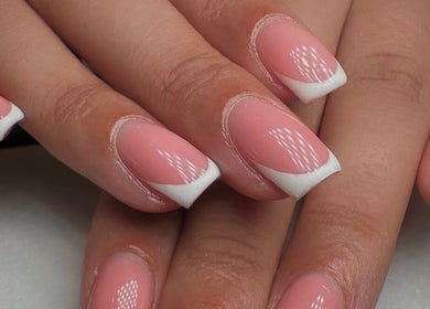 Stylish French manicure at Georgialees Beauty, Solihull, England, GB showcasing pink nails with white tips.