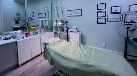 Inviting treatment room at The Lotus Chair, LLC in Boca Raton, Florida, US with certificates and equipment.