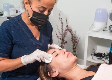 Professional facial treatment at The Lotus Chair, LLC in Boca Raton, Florida, US.